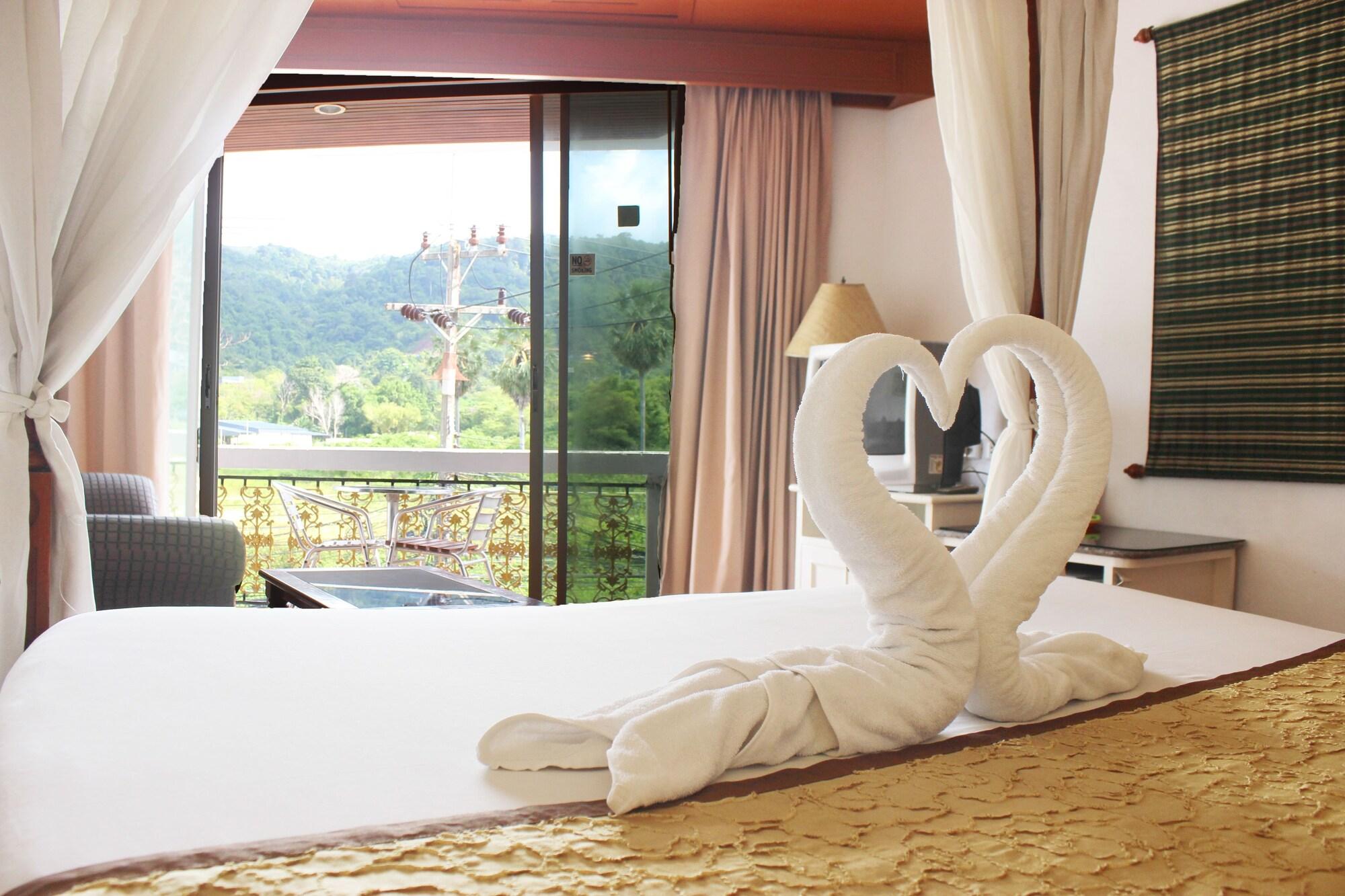 The Orchid Hotel Kalim Bay Patong Exterior photo
